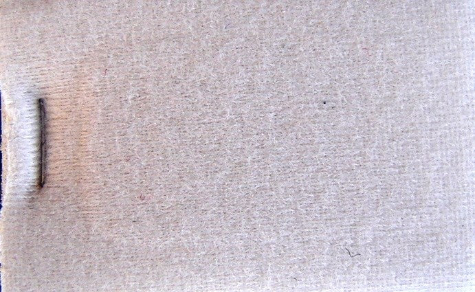 Light gray cloth + 3 mm of foam (price per meter width +/- 150 M)